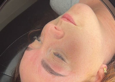 Facial treatment at Shxdy Skin Clinic in Manchester, England, GB highlighting glowing skin and relaxation.