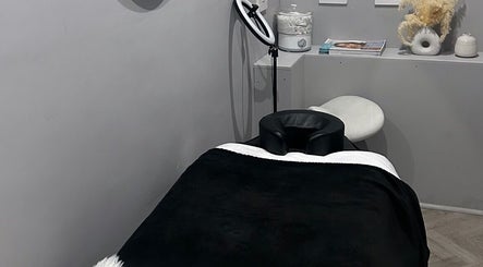 Relaxing treatment room at Shxdy Skin Clinic in Manchester, England, GB, showcasing modern spa facilities.