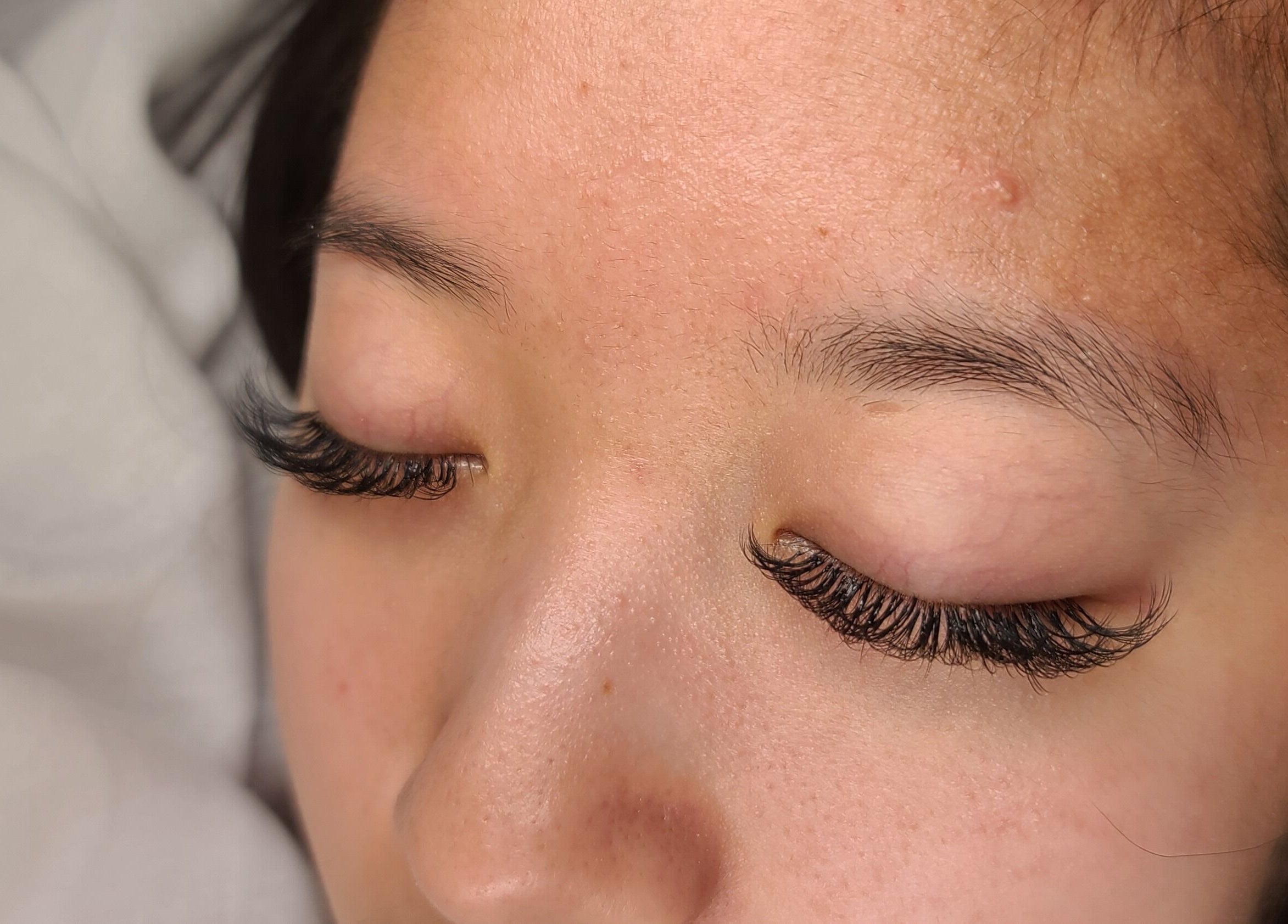 Close-up of eyelash extensions at La Beaute Haus (LBH) in Calgary, Alberta, CA, highlighting precision and elegance.