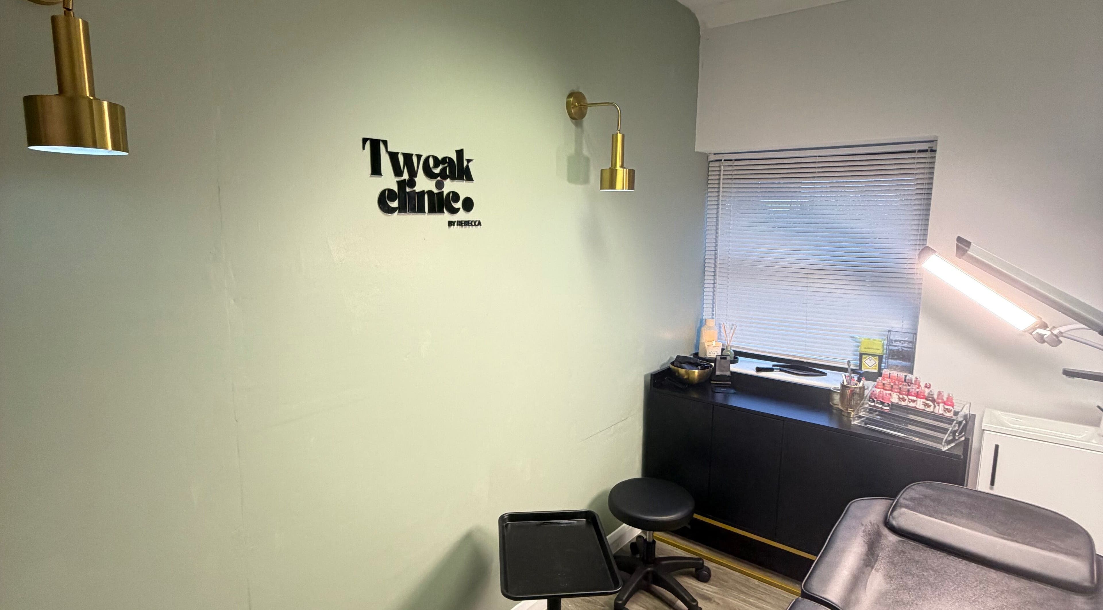 Modern treatment room at Tweak Clinic, Peterborough, England, GB with stylish decor and professional equipment.