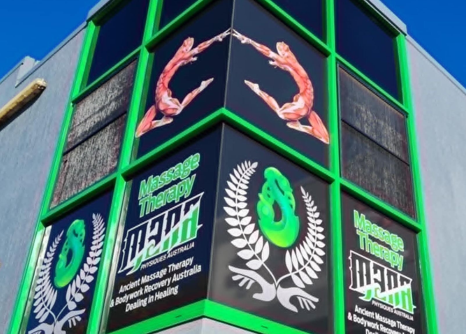 Exterior of Mana Physiques in South Toowoomba, Queensland with bold signage and modern design.