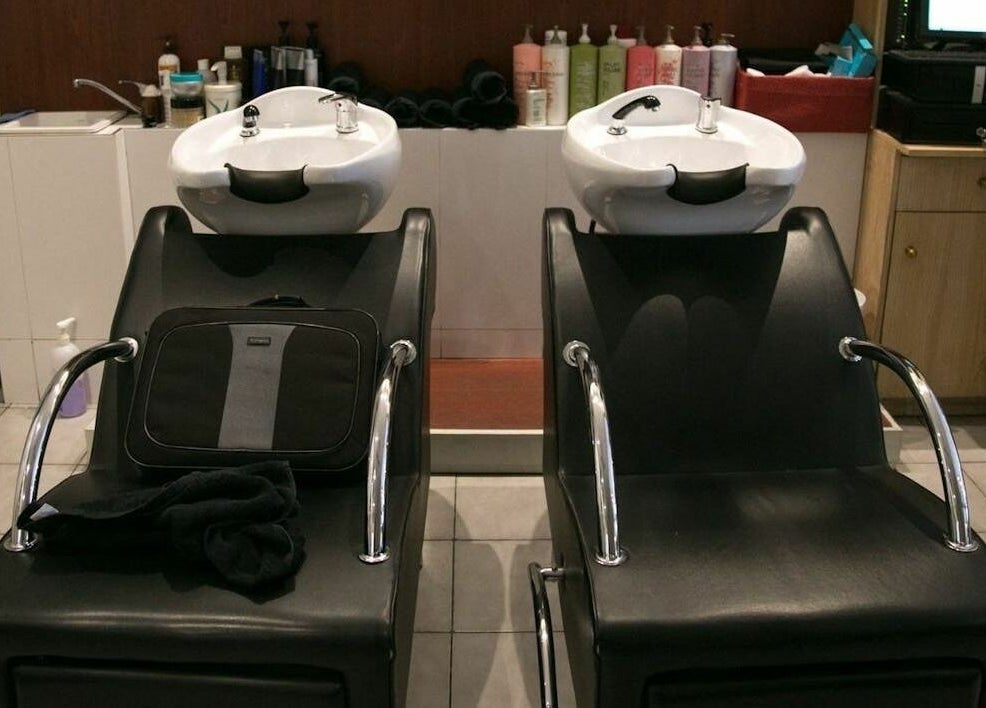 Modern wash stations at Carpe Diem Studio, Melbourne, Victoria, AU, offering premium hair care services.