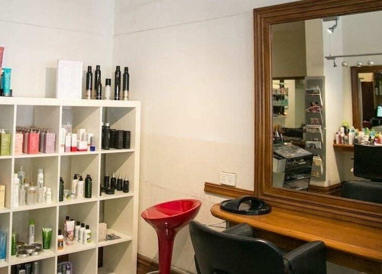 Stylish beauty station at Carpe Diem Studio, Melbourne, Victoria, AU, featuring shelves of premium products.