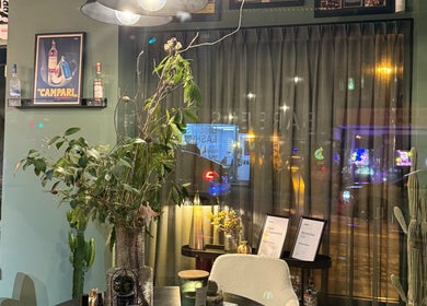 Chic interior of Mayhem Melbourne (Barbers) with decor and seating, Melbourne, Victoria, AU.