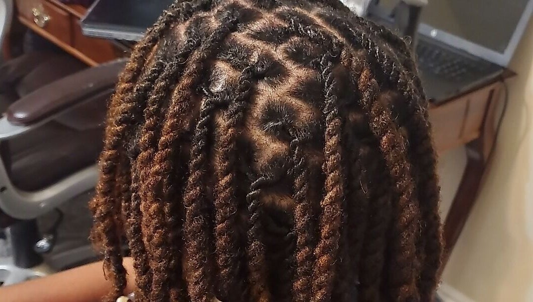 Intricate locs styled at Naturally Loc'd by Ci, Charlotte, North Carolina, US.
