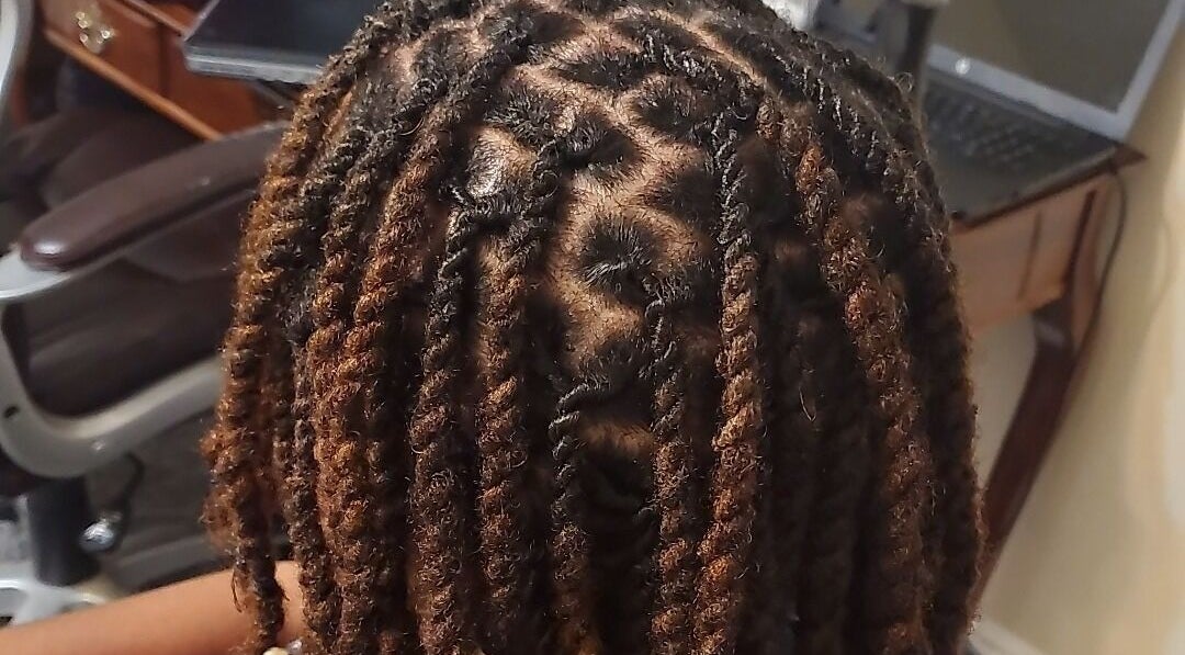 Intricate locs styled at Naturally Loc'd by Ci, Charlotte, North Carolina, US.