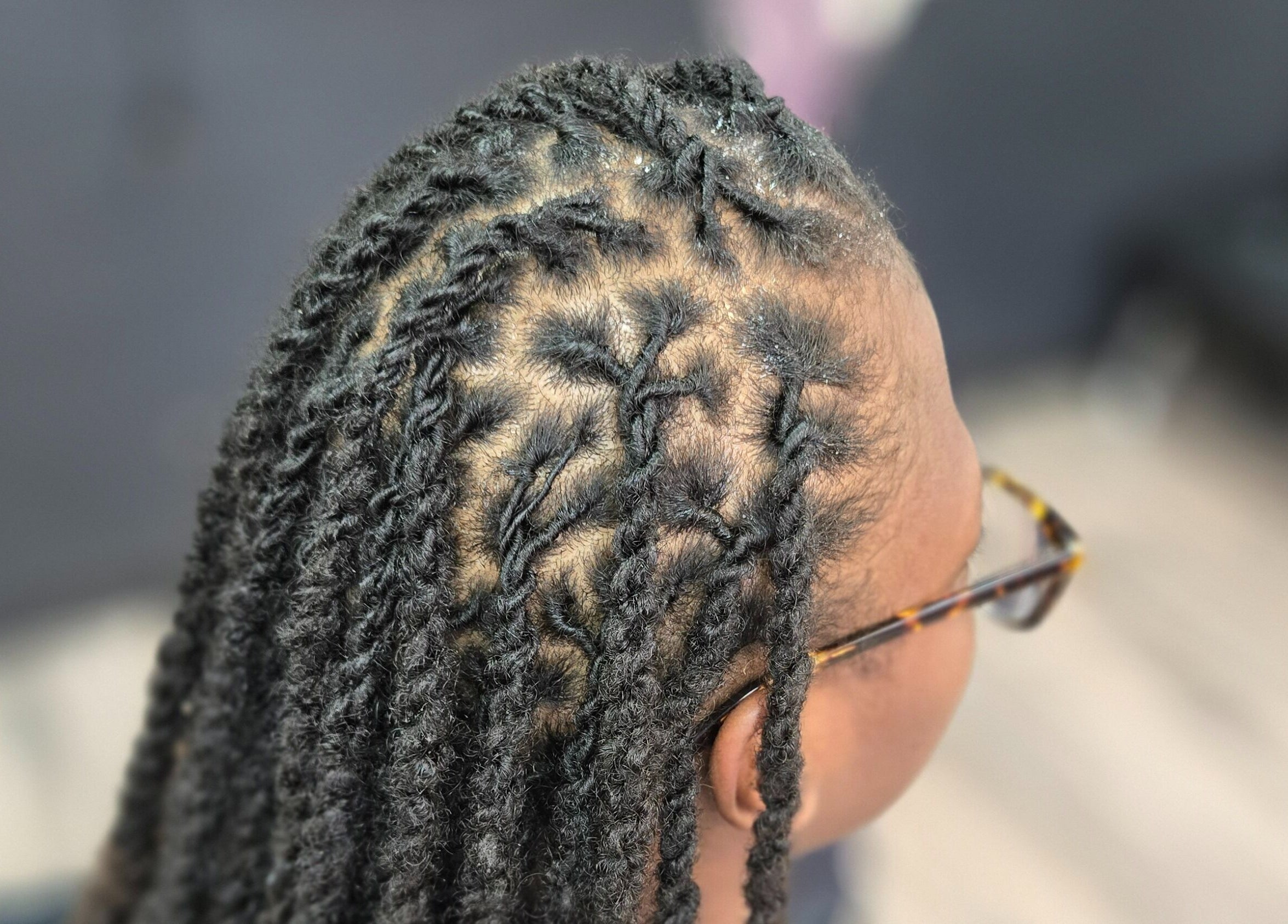 Intricate braiding at Naturally Loc'd by Ci in Charlotte, North Carolina, US, showcasing precise styling.