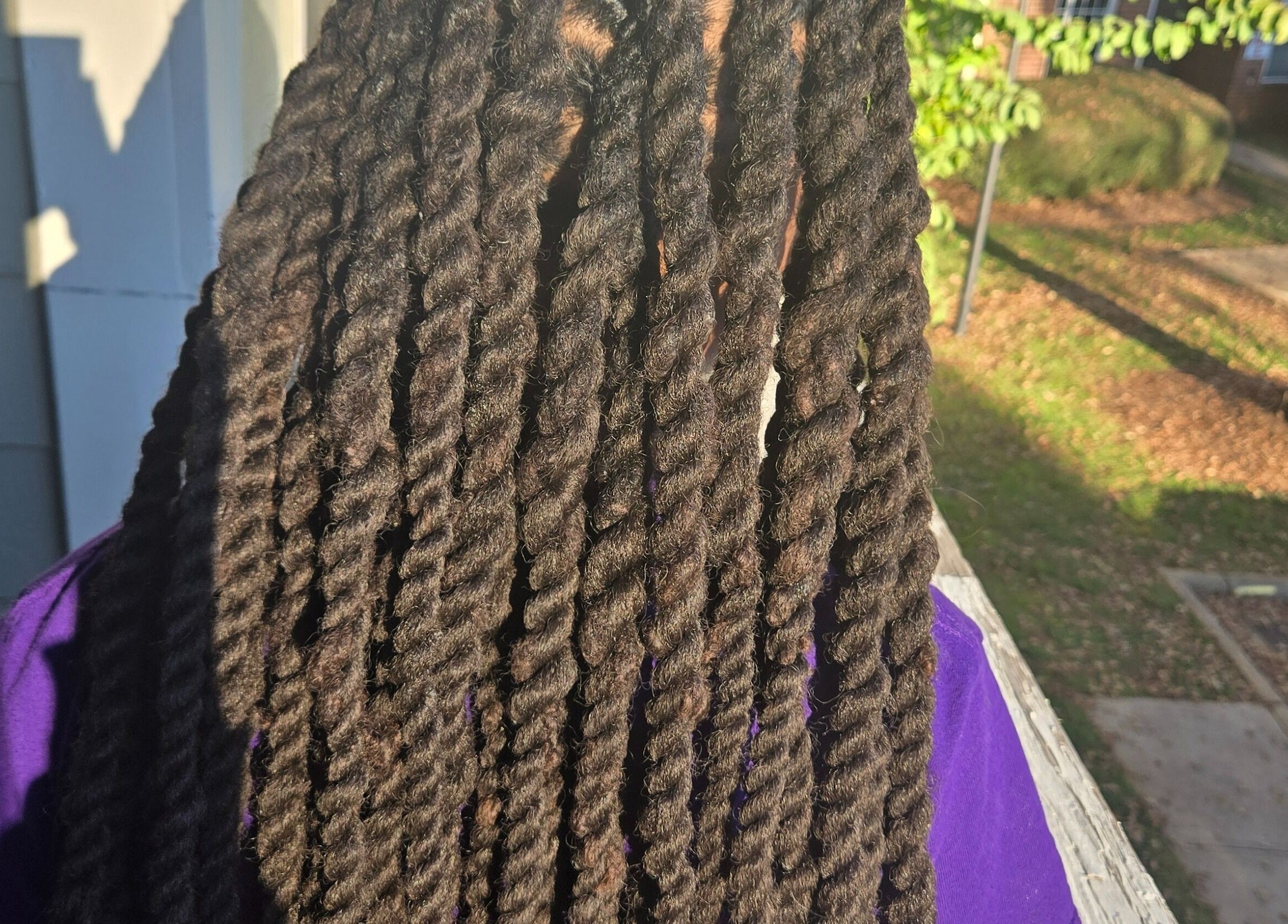 Beautiful twist hairstyle at Naturally Loc'd by Ci in Charlotte, North Carolina, US, showcasing intricate textures.