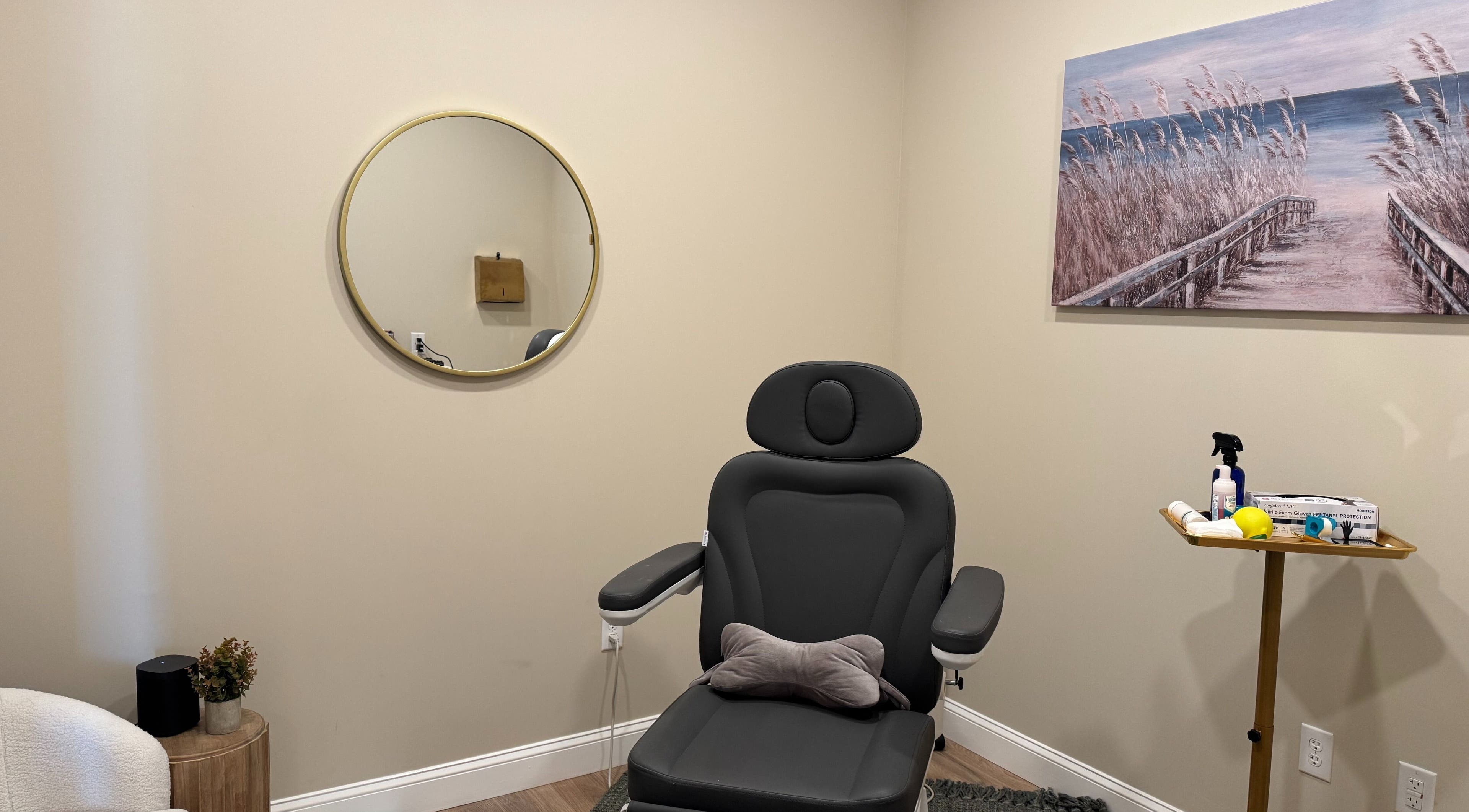 Calm treatment room at Synergy Wellness and MediSpa, Oceanport, New Jersey, US, featuring a plush chair.