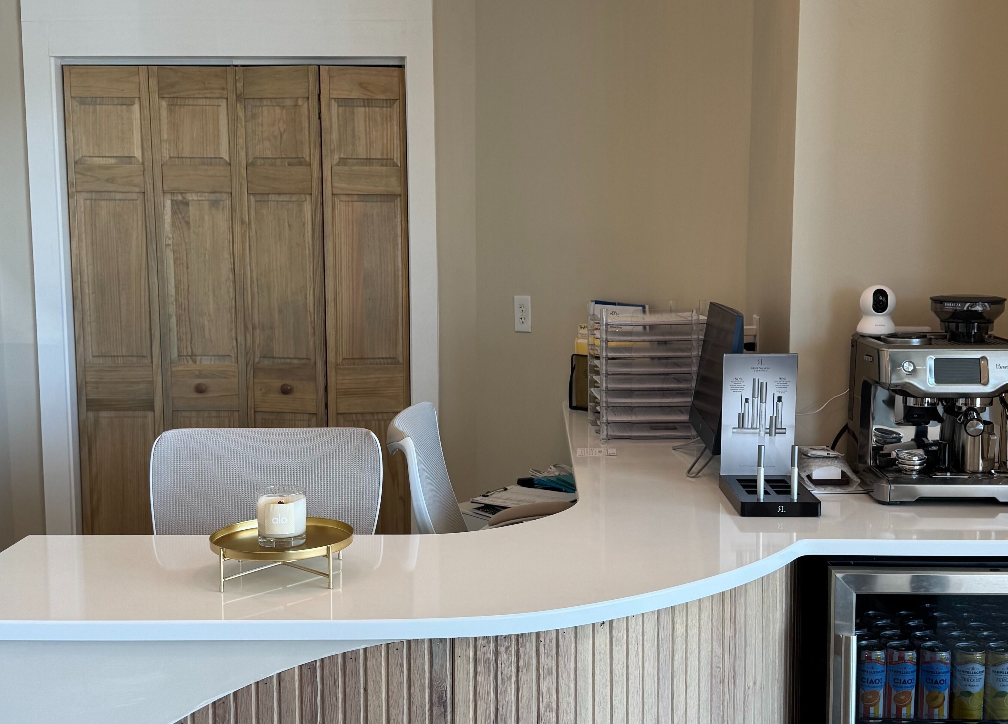 Reception area at Synergy Wellness and MediSpa, Oceanport, New Jersey, US with modern decor and amenities.