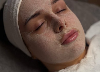Relaxing facial mask treatment at FIBA Clinic in Leeds, England, GB, showcasing skin rejuvenation service.