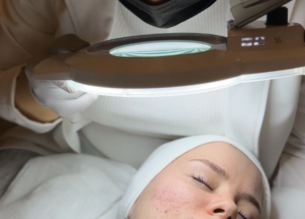 Facial treatment at EG Nails & Spa in Naperville, Illinois, US under professional care.