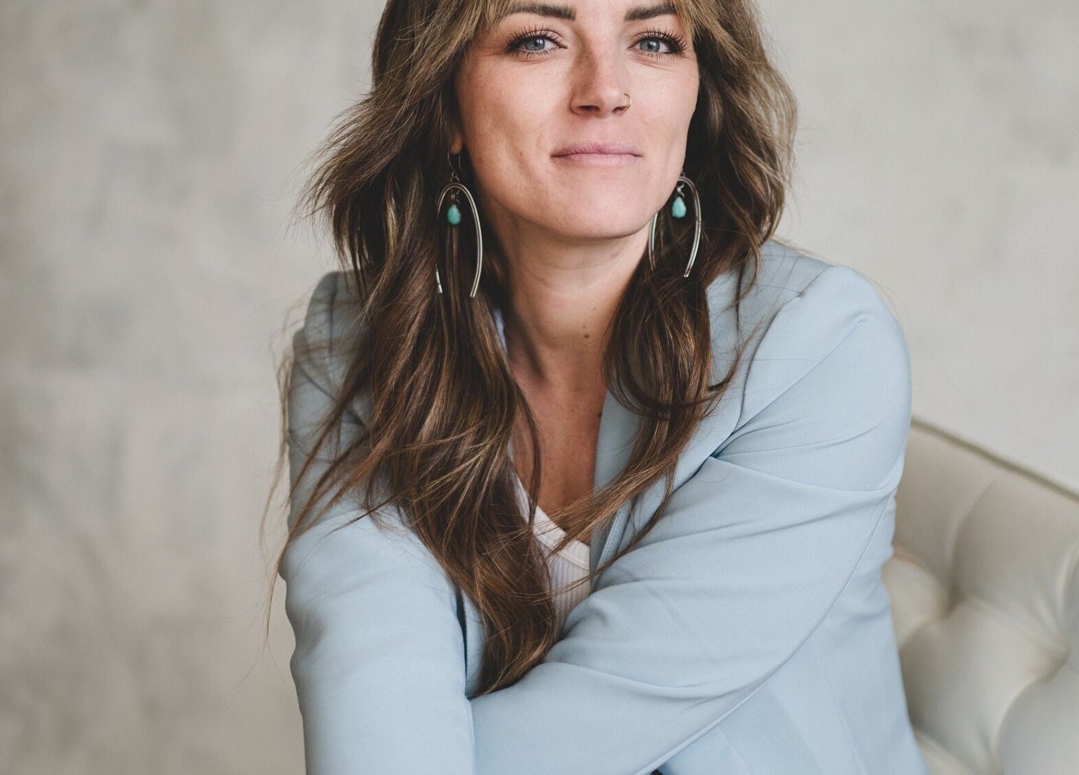 Woman relaxed at Pura Vida Salon, Livingston, Montana, US, embodying modern elegance and beauty.