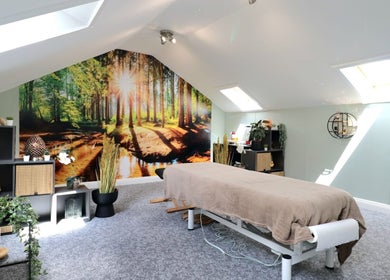 Calming massage room at Myobody Balance in Drogheda, County Louth, IE with nature-themed decor.