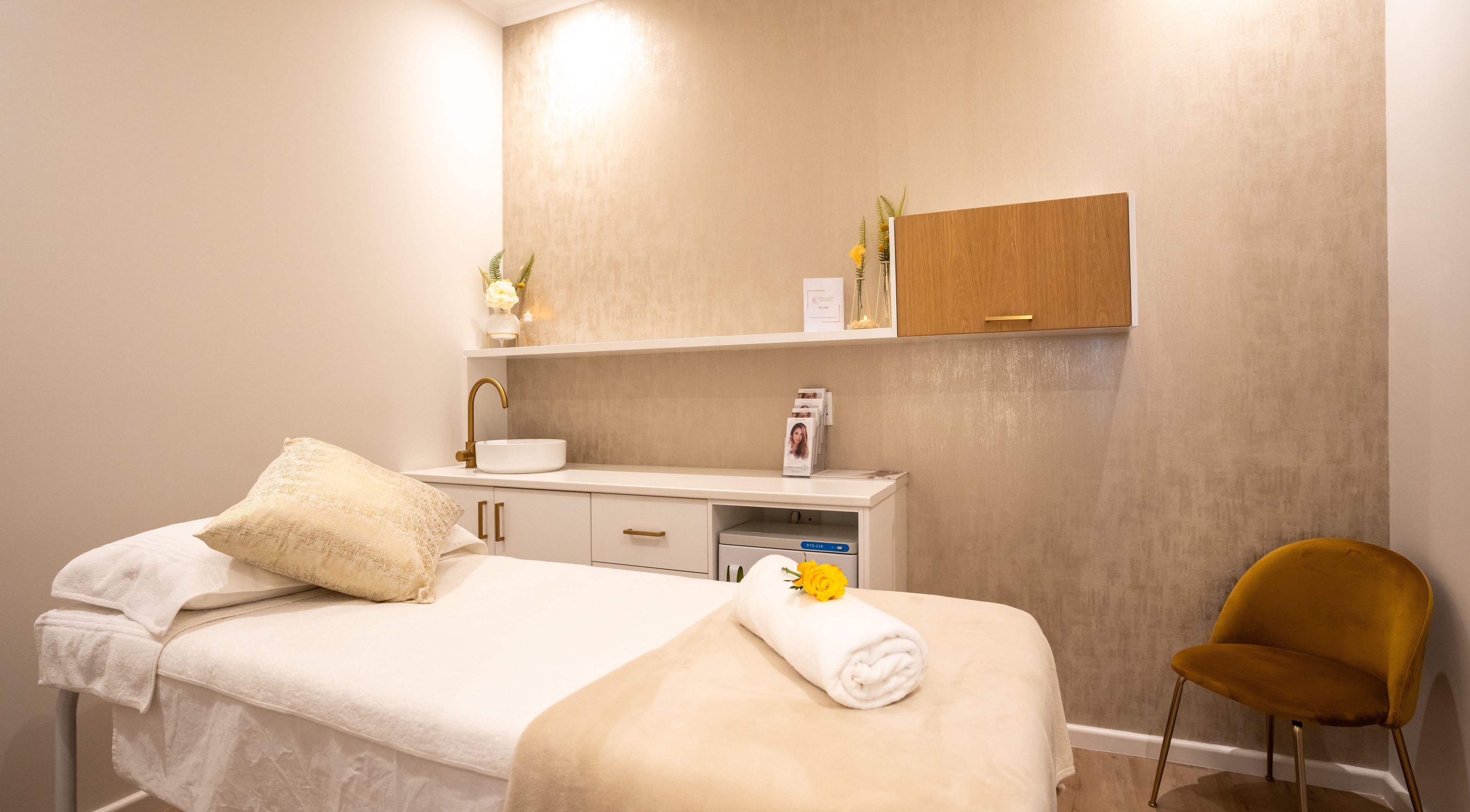 Tranquil spa room at Dermafusion Aesthetics, Stellenbosch, Western Cape, ZA featuring plush treatment bed.