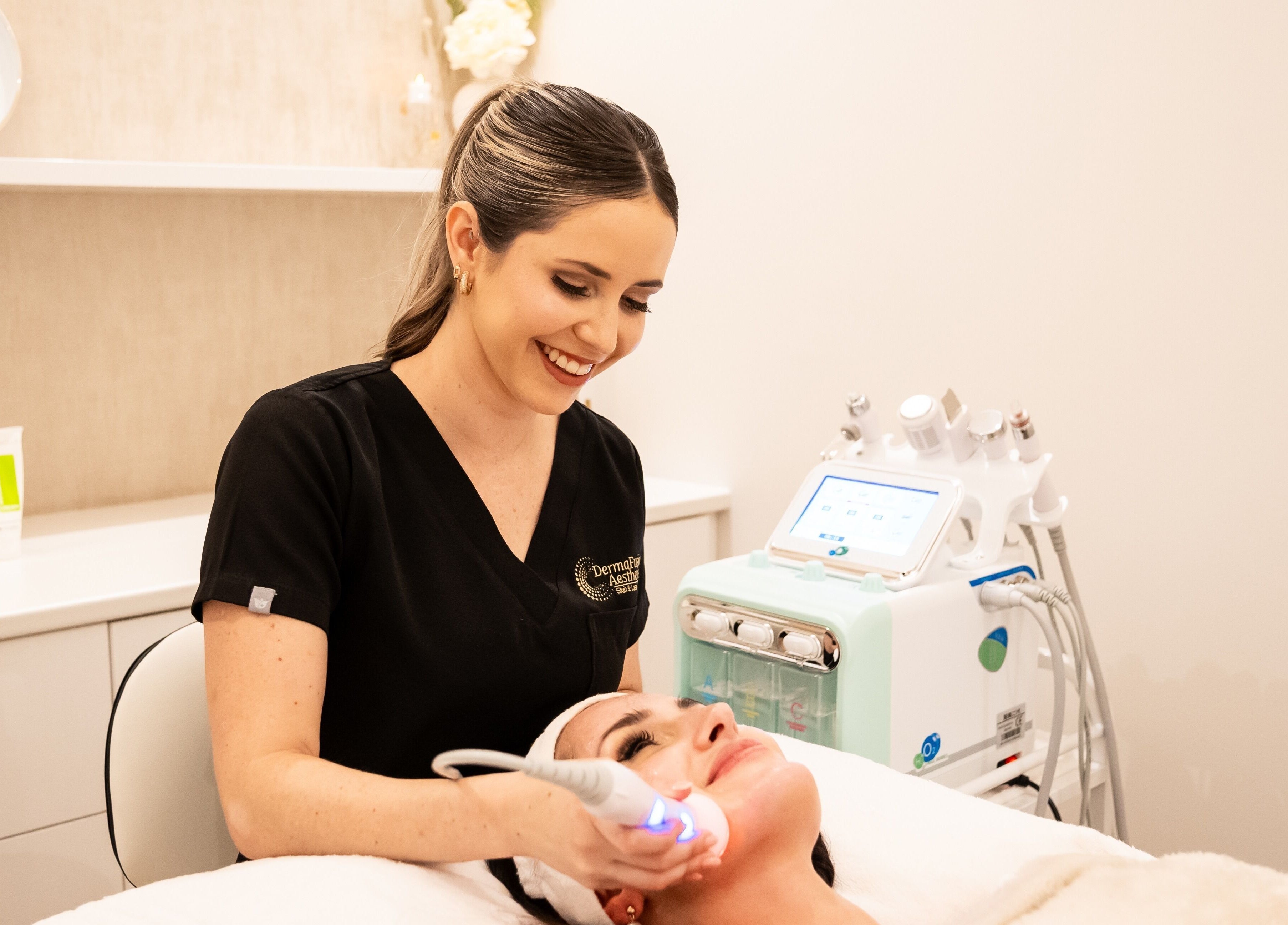 Skincare treatment at Dermafusion Aesthetics, Stellenbosch, Western Cape, ZA. Professional therapist using facial device.