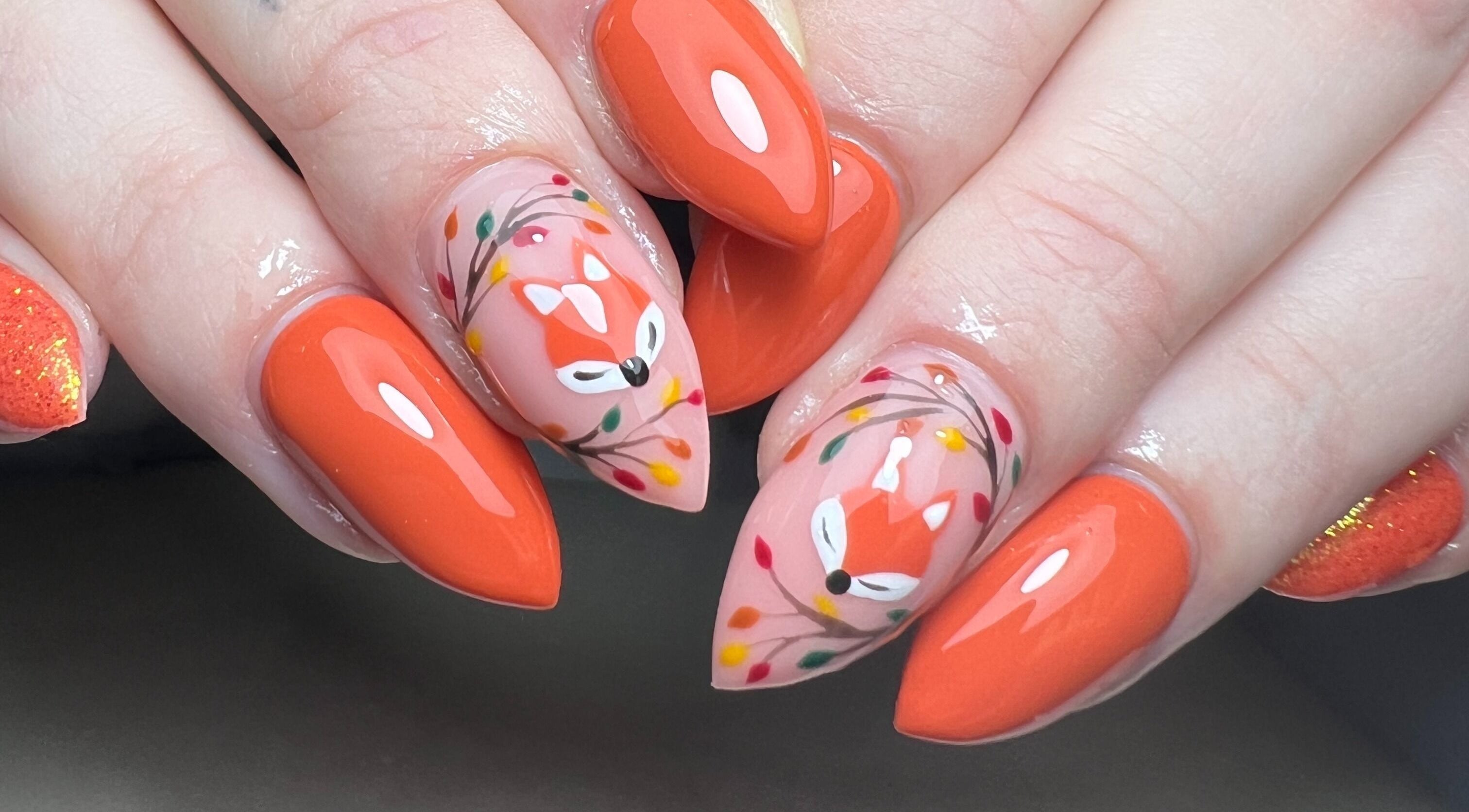 Manicured nails with fox and floral art at Moo Nails & Beauty, Exeter, England, GB.
