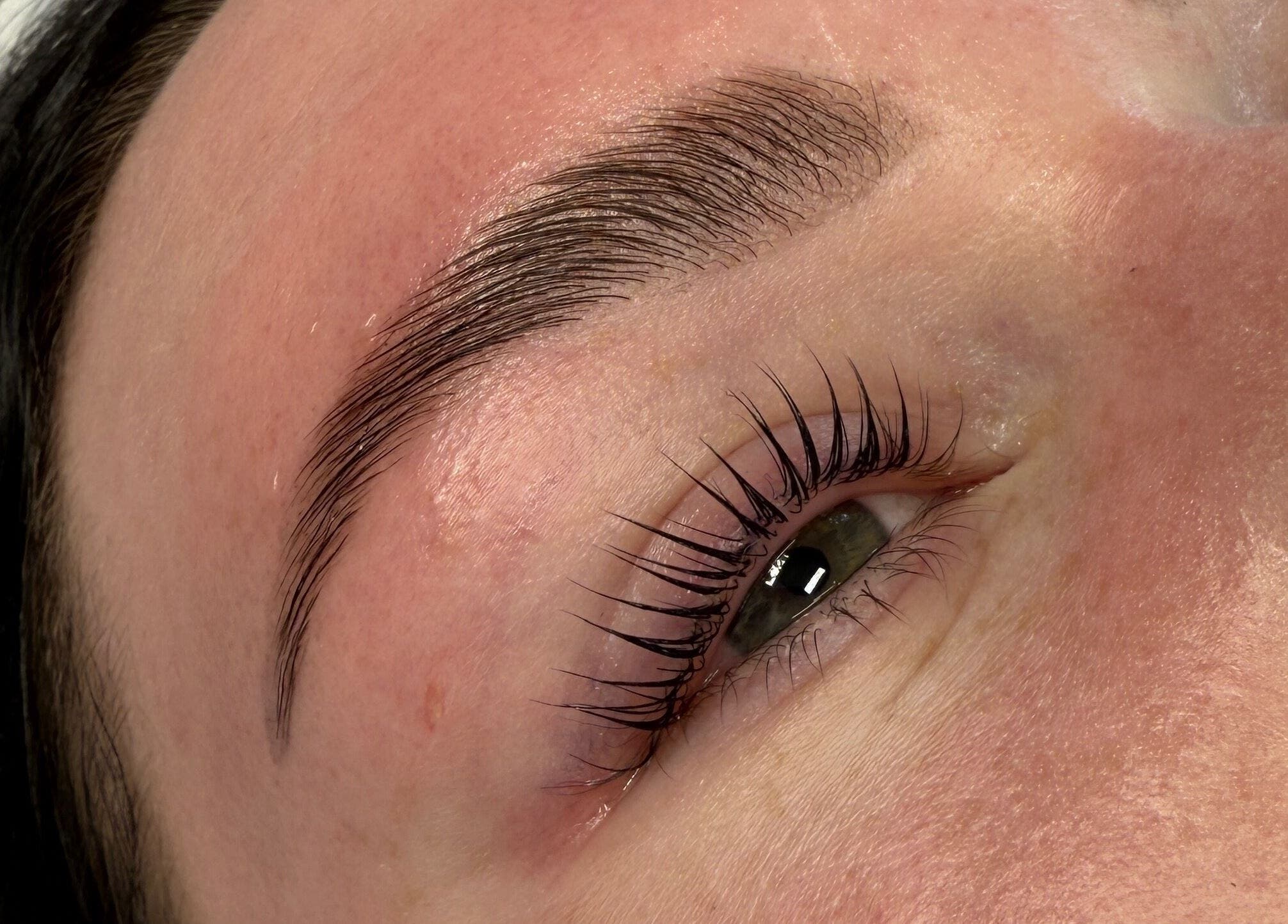 Close-up of beautifully groomed eyebrows and lashes at Moo Nails & Beauty, Exeter, England, GB.