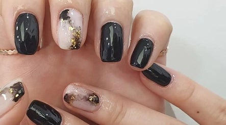Stylish black and gold nail art at Seu Momento Beauty, Subiaco, Western Australia, AU.