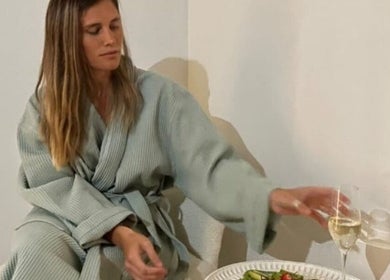 Woman in robe enjoying relaxation at Seu Momento Beauty, Subiaco, Western Australia, AU.