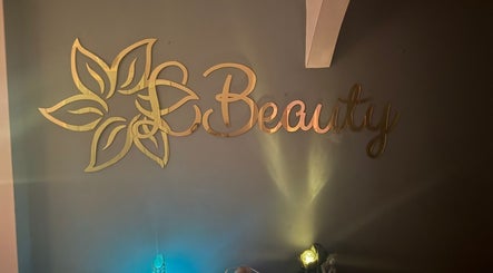 Golden LBeauty logo on wall at LBeauty, Limerick, County Limerick, IE.