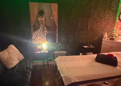 Serene massage room at LBeauty, Limerick, County Limerick, IE with cozy decor and ambient lighting.