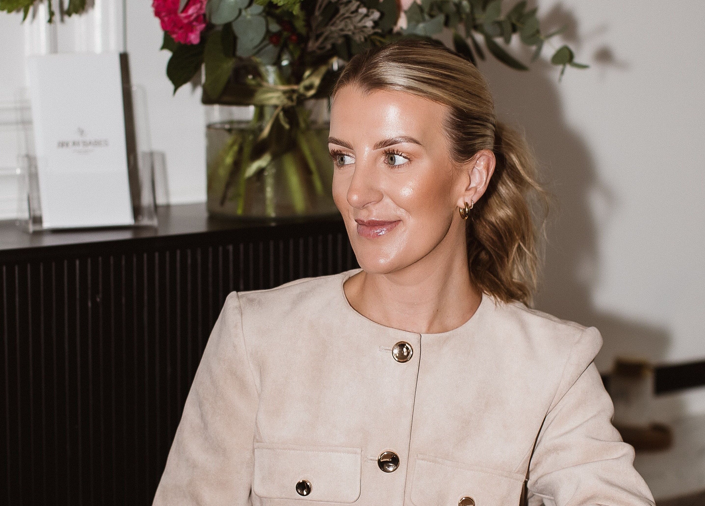 Woman smiling in BROW BABES - PHOEBE, Truro, England, GB with elegant decor.