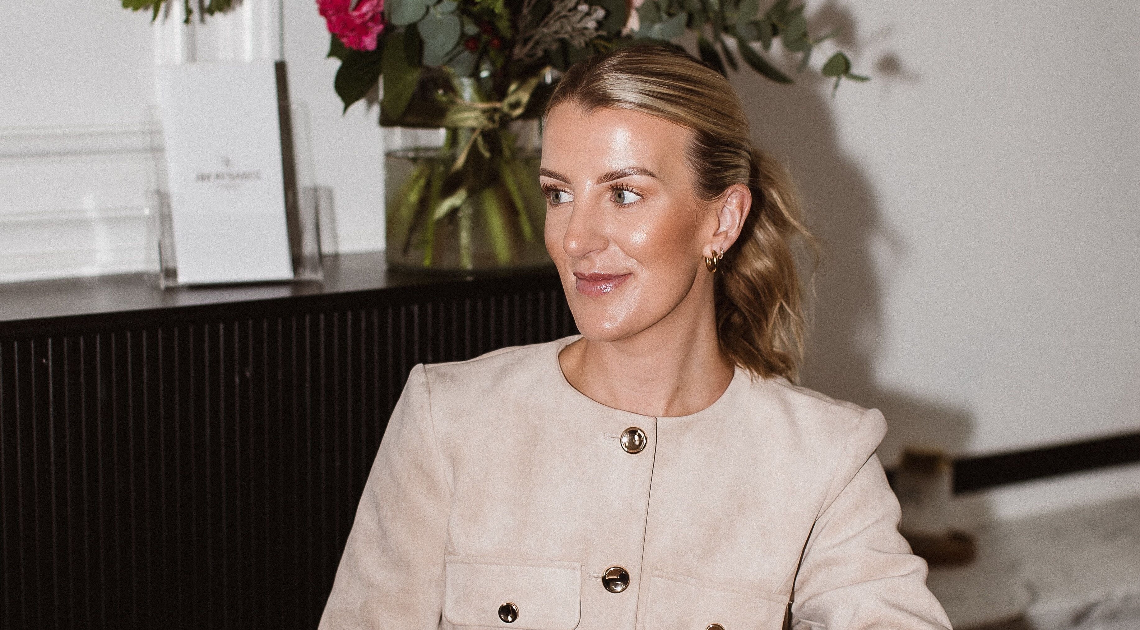 Woman smiling in BROW BABES - PHOEBE, Truro, England, GB with elegant decor.