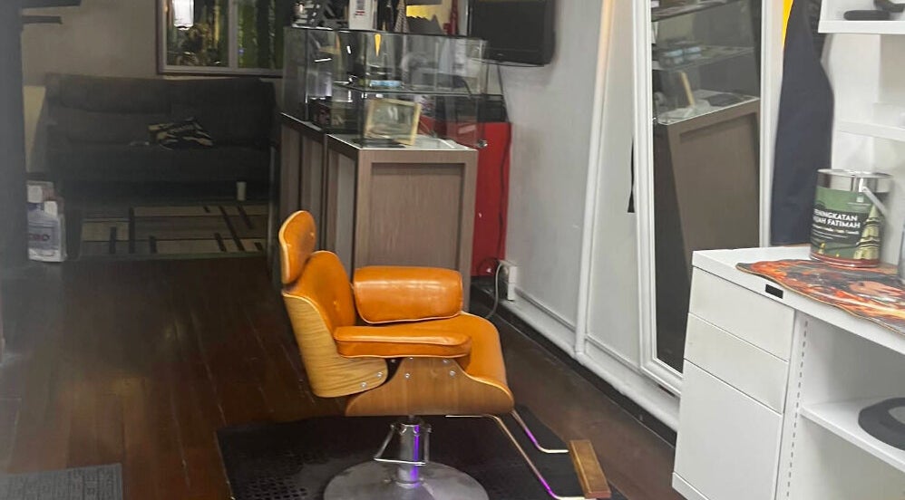 Cozy interior at NYO Studios with vintage orange salon chair, Singapore, Singapore, SG.