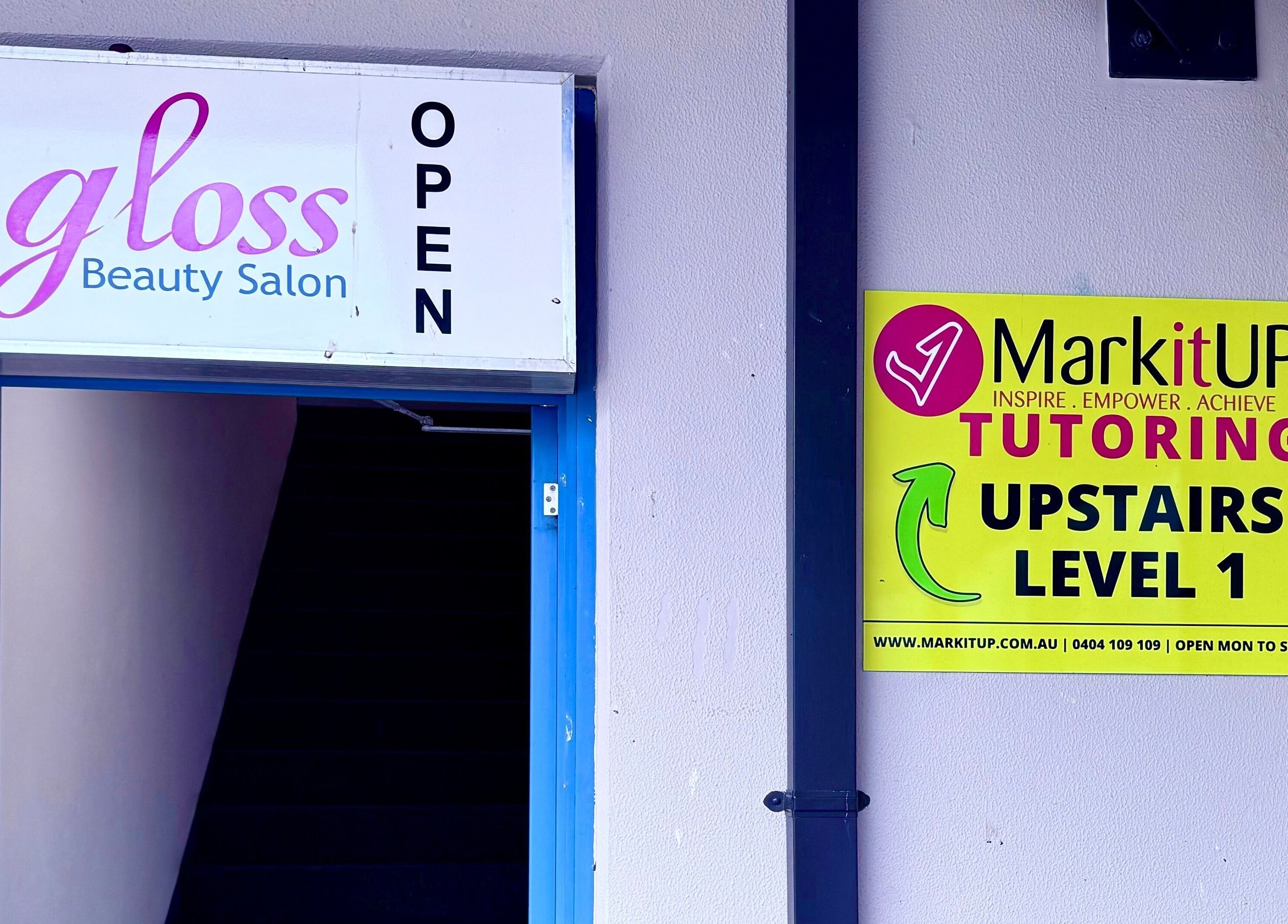 Entrance to Gloss Beauty Salon in Prestons, New South Wales, AU, welcoming with open sign.