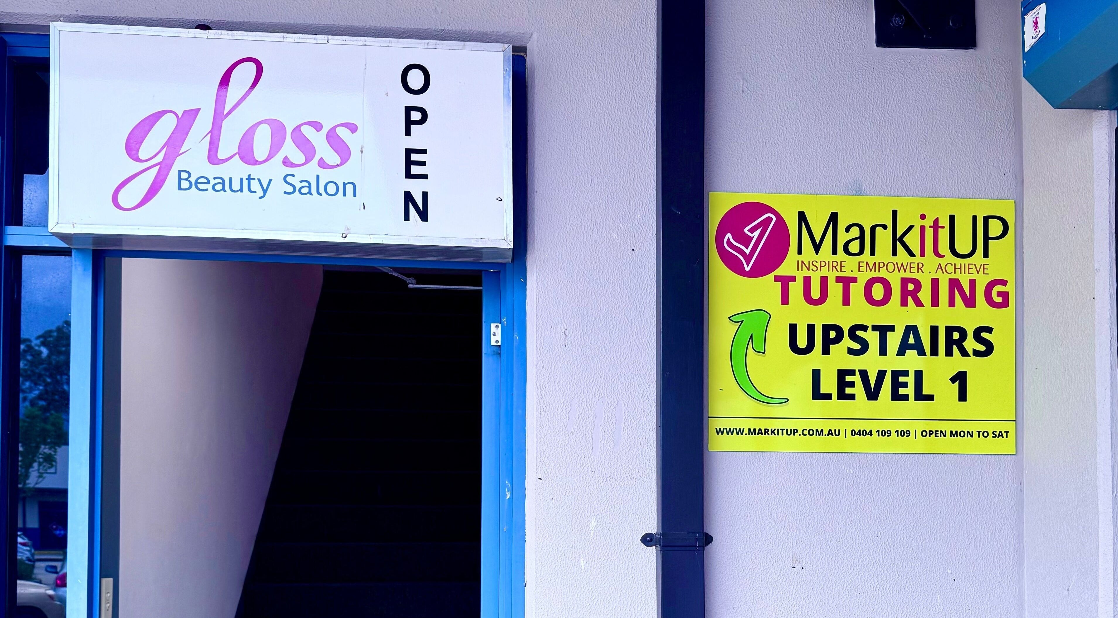 Entrance to Gloss Beauty Salon in Prestons, New South Wales, AU, welcoming with open sign.