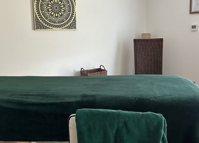 Tranquil therapy room at Orchard Holistic Therapy in Waterlooville, England, GB with a massage table.