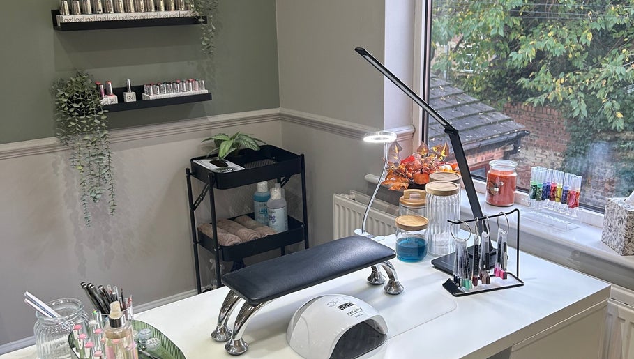 Chic nail workspace at Eden By Elizabeth, Newton-le-Willows, England, GB, with tools and greenery.