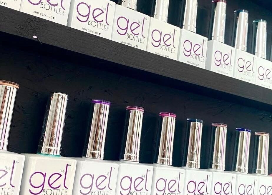 A vibrant gel bottle display at Eden By Elizabeth, Newton-le-Willows, England, GB nail salon.