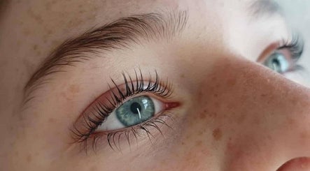 Close-up of vibrant blue eye with long lashes at Amore, St Austell, England, GB.