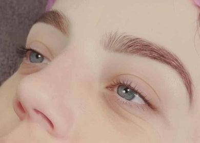 Close-up of expertly shaped eyebrows at Amore, St Austell, England, GB.