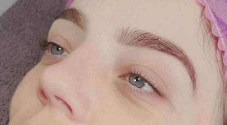 Close-up of expertly shaped eyebrows at Amore, St Austell, England, GB.