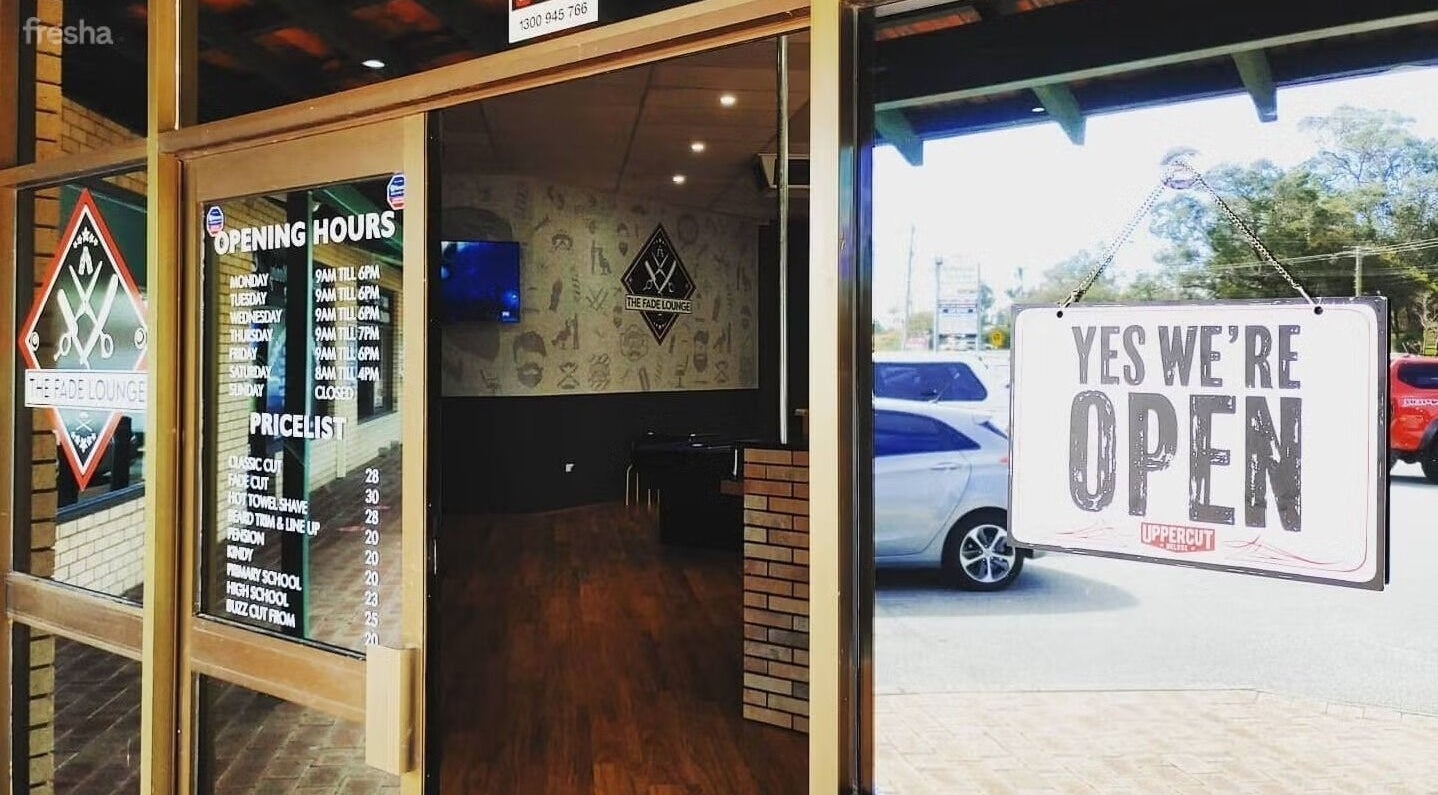 Entrance of The Fade Lounge - Currambine, Western Australia, AU, showing opening hours and 'Yes We're Open' sign.