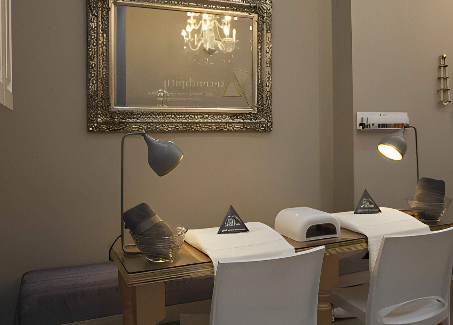 Stylish nail care station at Serendipity Beauty Studio, George, Western Cape, ZA with decorative mirror and lighting.