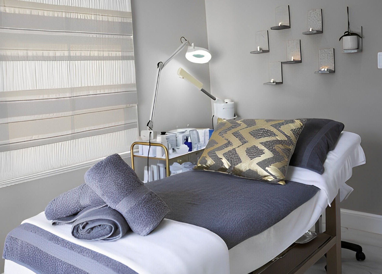 Serendipity Beauty Studio's serene massage room in George, Western Cape, ZA with elegant decor.