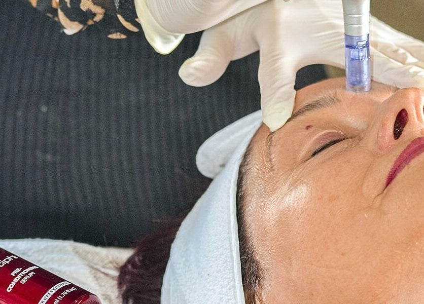 Facial treatment at Serendipity Beauty Studio, George, Western Cape, ZA, promoting radiant skin with serum.