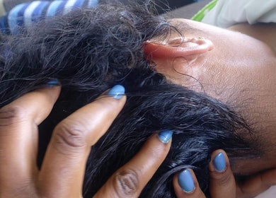 Relaxing scalp massage at Molly's Hair and Spa Cayman in Grand Cayman, KY for ultimate rejuvenation.