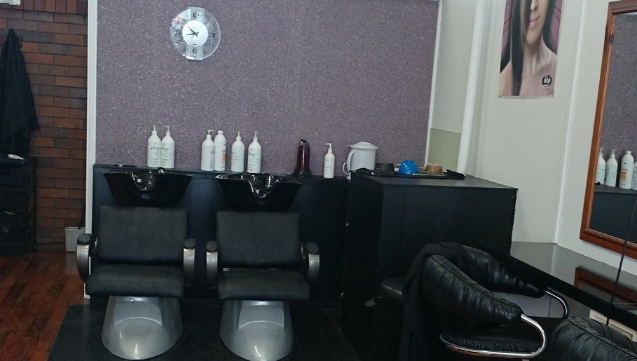 Modern shampoo chairs at Maxine's Hair Care in Kallangur, Queensland, AU offering stylish hair treatments.