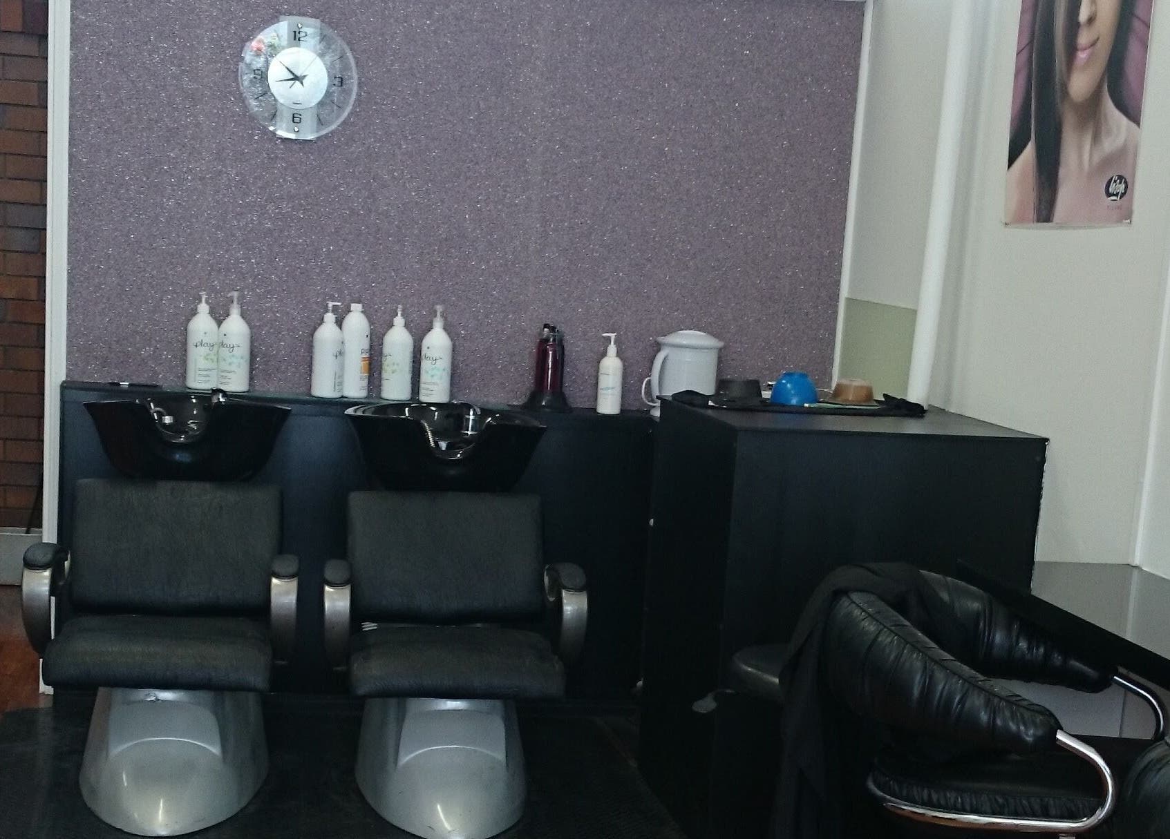 Modern shampoo chairs at Maxine's Hair Care in Kallangur, Queensland, AU offering stylish hair treatments.