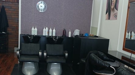 Modern shampoo chairs at Maxine's Hair Care in Kallangur, Queensland, AU offering stylish hair treatments.
