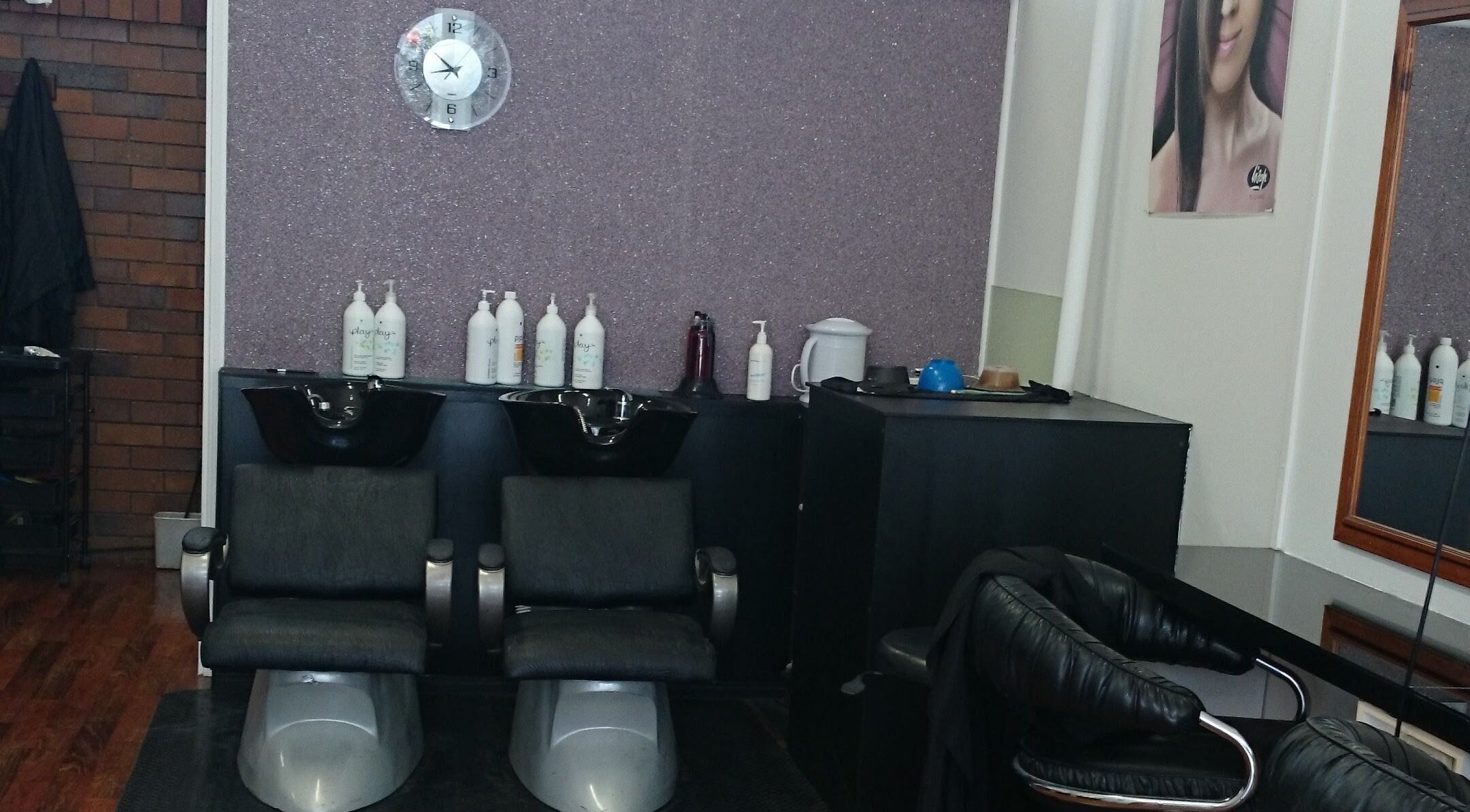 Modern shampoo chairs at Maxine's Hair Care in Kallangur, Queensland, AU offering stylish hair treatments.