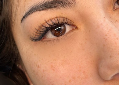 Close-up of expertly done eyelash extensions at Hillary Maria Lashes in Vancouver, British Columbia, CA.