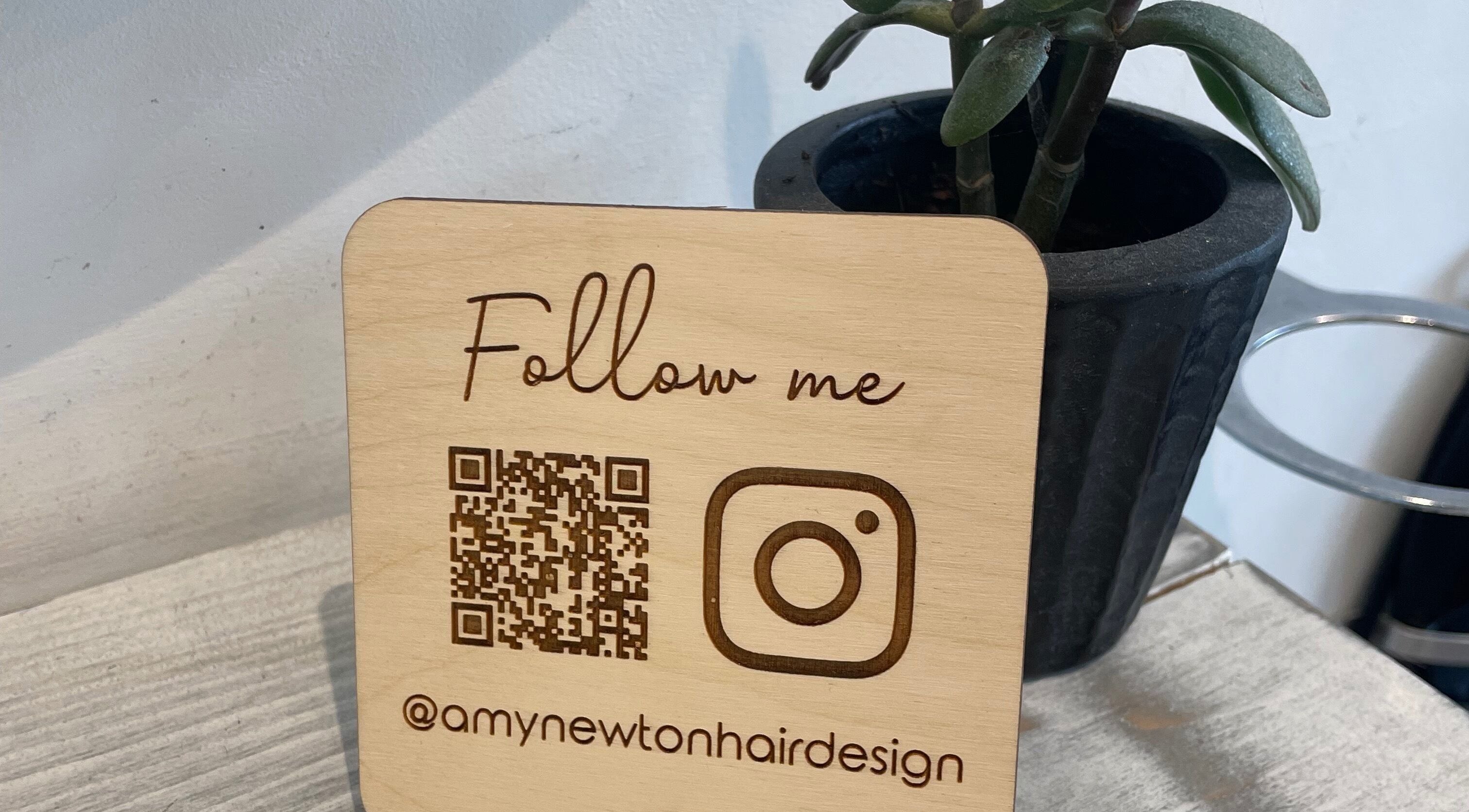 Follow us sign at Amy Newton Hair Design, Cheswick Green, England, GB.