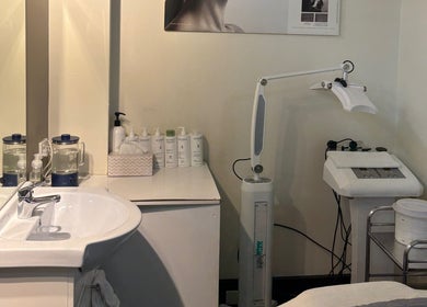 A tranquil treatment area at Hornsby Beauty Salon, Hornsby, New South Wales, AU with skincare products and equipment.