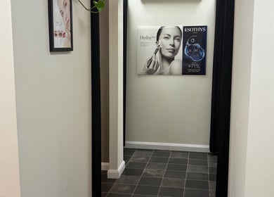 Entrance hallway at Hornsby Beauty Salon in Hornsby, New South Wales, AU showcasing elegant wall decor.
